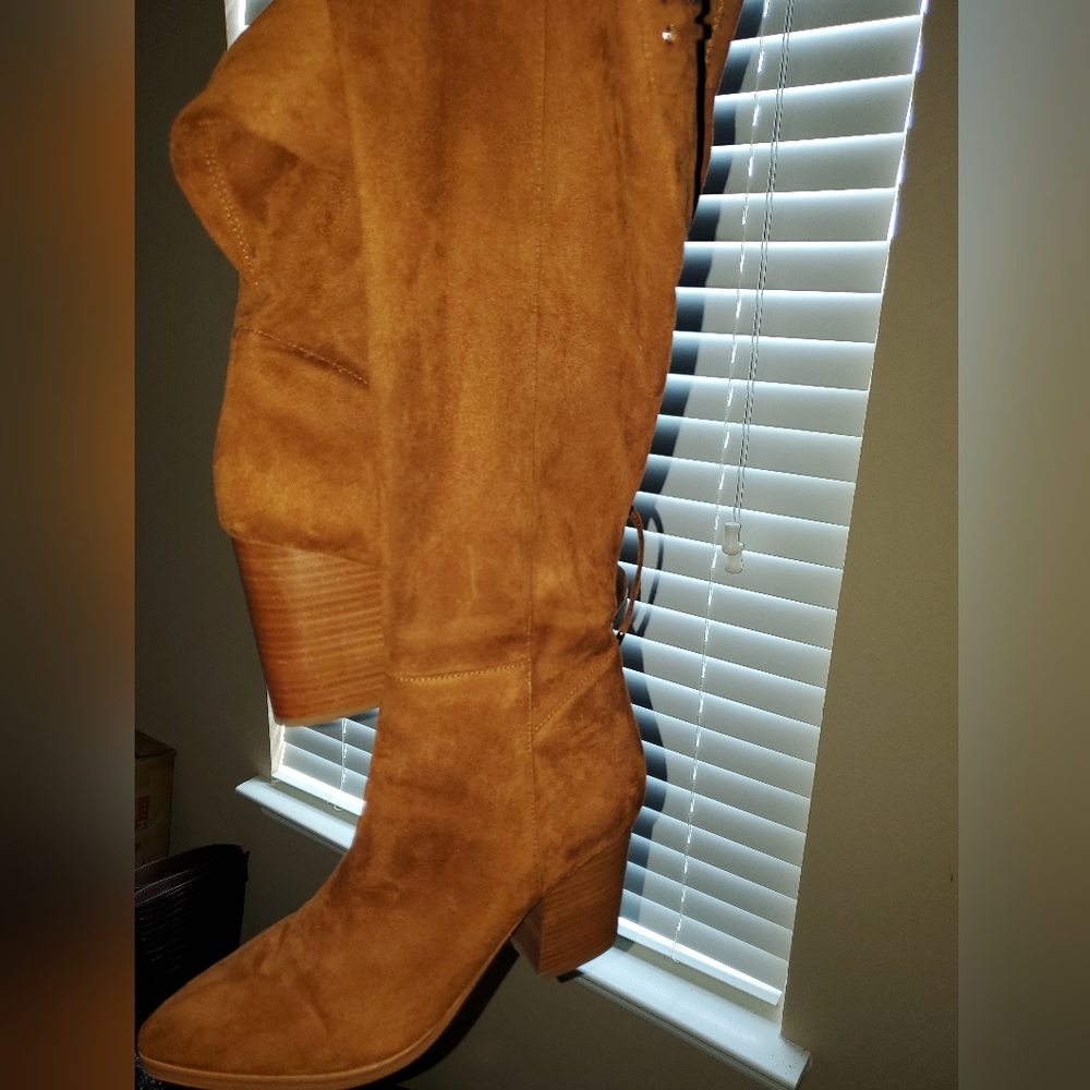 Camel colored up to the knee boots